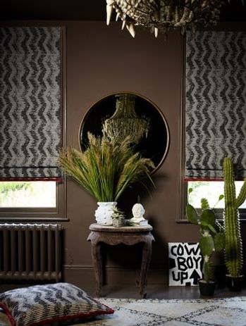 Cadillac Noir Roman blinds and cushion with Colette Vixen fringing
