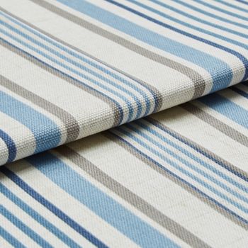 White roman fabric with beige and blue stripes repeating across the material