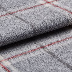 Check styled grey fabric also featuring lines in faded black and red