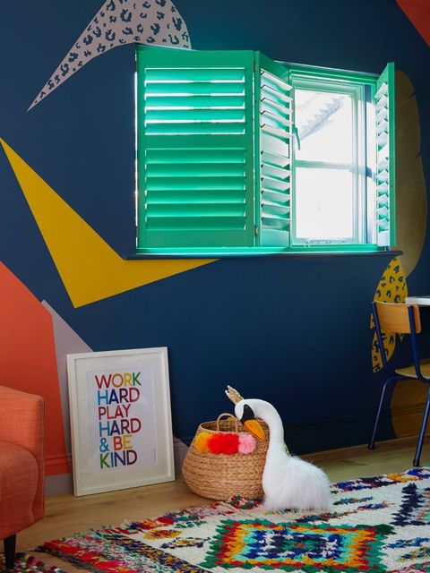 A small window covered by luminous green Shutters in a children's bedroom