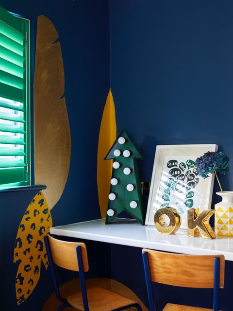 A playroom with luminous green shutters in the corner of the photo