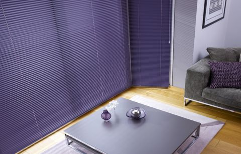 Living room with venetian blinds in a beautiful purple damson colour