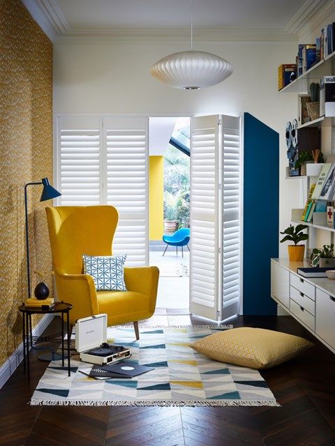 Vellum tracked Shutters in a living room