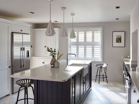 Henley white tier-on-tier shutters in kitchen
