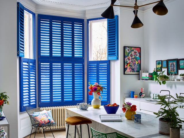 Custom colour shutters in blue in kitchen