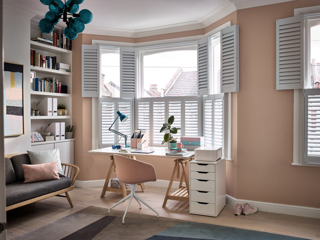 Tier on tier shutters in ice white in home office