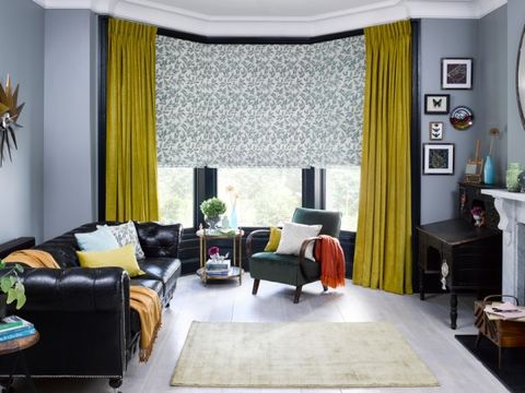 Lyon Sulphur curtain and Delizia Teal Roman blinds in living room