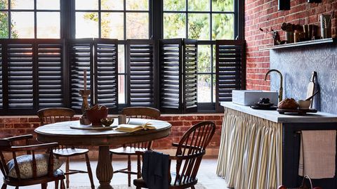 dark grey cafe-style shutters in kitchen dining room