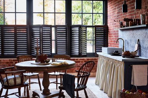 dark grey cafe-style shutters in kitchen dining room