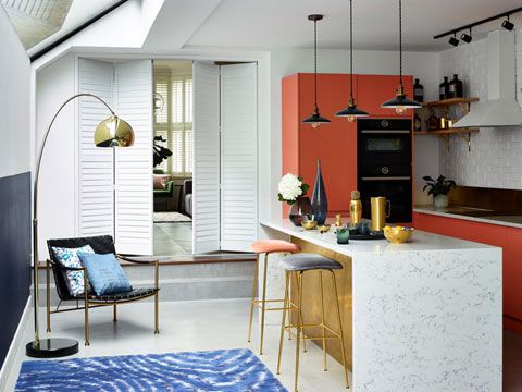 White tracked shutters in kitchen