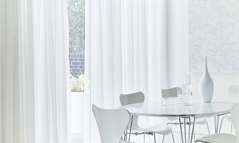 Clean White Dining Area with Wisp White Voile Curtains