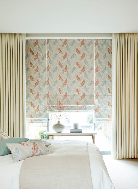 Tranquility Dawn Roman Blinds with Tetbury Ivory Curtains in bedroom