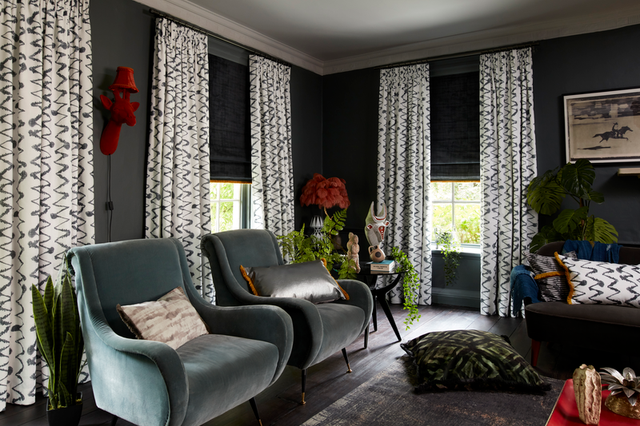Living Room with Blackout Curtains in Wolfe Smoulder fabric and Cley Mole Dark Grey Roman Blinds from the Abigail Ahern Collection 