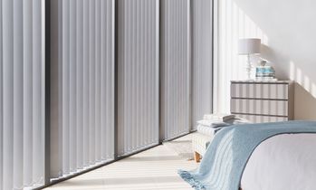 Cordova Grey Vertical blind in bedroom
