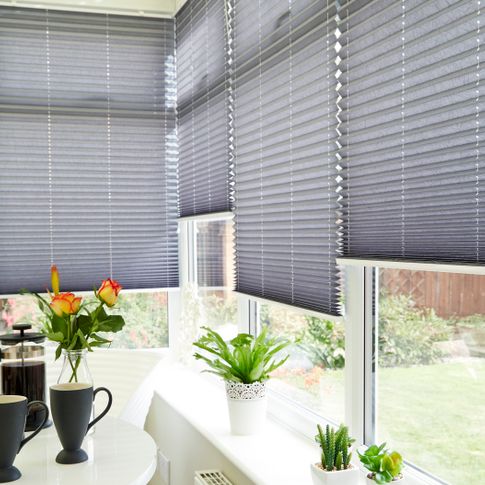 Crush Charcoal Pleated blind in conservatory