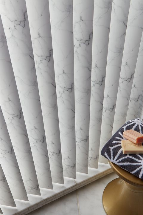Close up of vertical blinds in a marble effect fabric