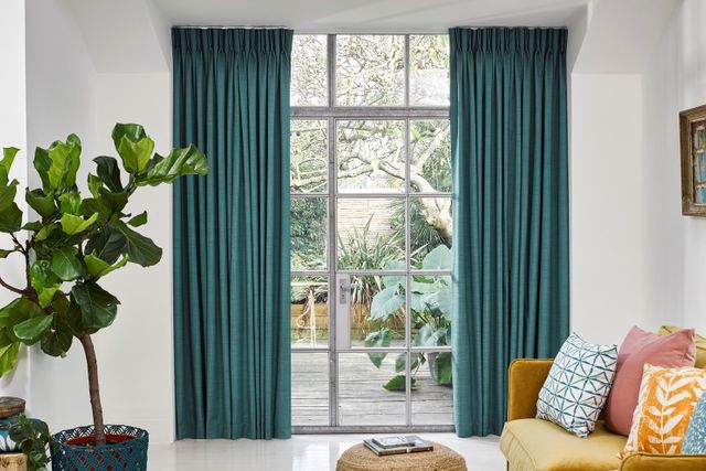 Garden Room with Teal Curtains in Clarence Teal Fabric