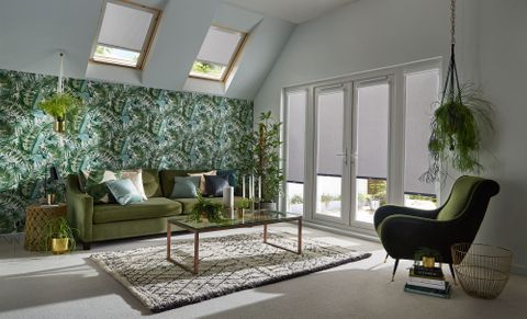 tropical theme room with acacia silver color roller blinds on patio door and skylight windows