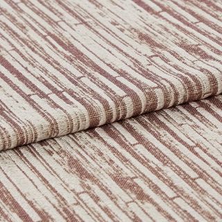 Cream layered with stripes of red that makes the material look textured 