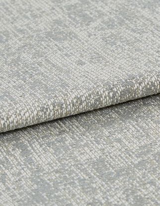 Grey shimmering material with dark grey layered into the fabric to create a layered look