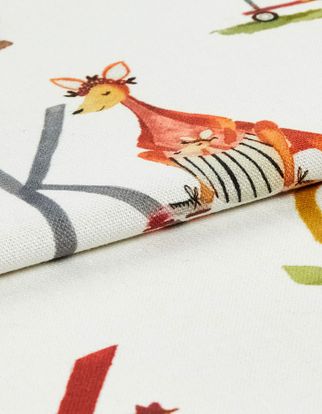 A roll of fabric that is decorated with the letters of the alphabet and animals that matching each word