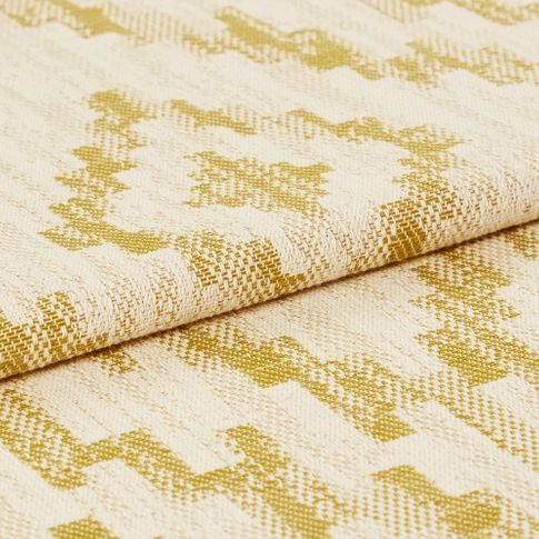 Cream coloured base fabric that is folded and designed with a yellow coloured tribal design that repeats across the material