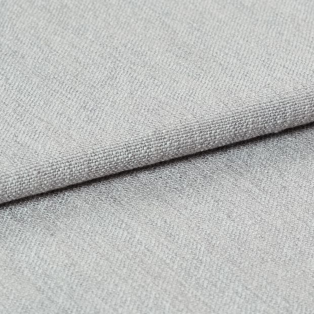 Light grey coloured fabric that has been folded over to display the material