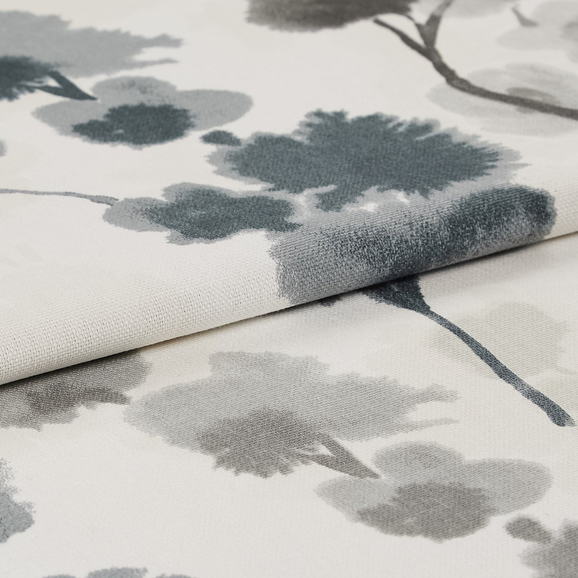 Ink patterned design of Claudia Shadow on a roller blind 