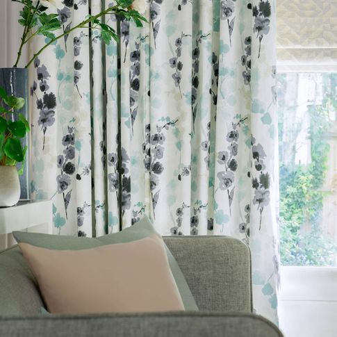 Claudia mist curtains and terrazo lavendar romans in living room 