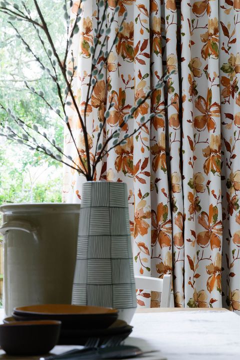 Close up of Forenza Apricot curtains in dining room