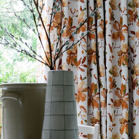 Close up of Forenza Apricot curtains in dining room