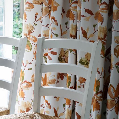 close up Forenza Apricot curtains in dining room