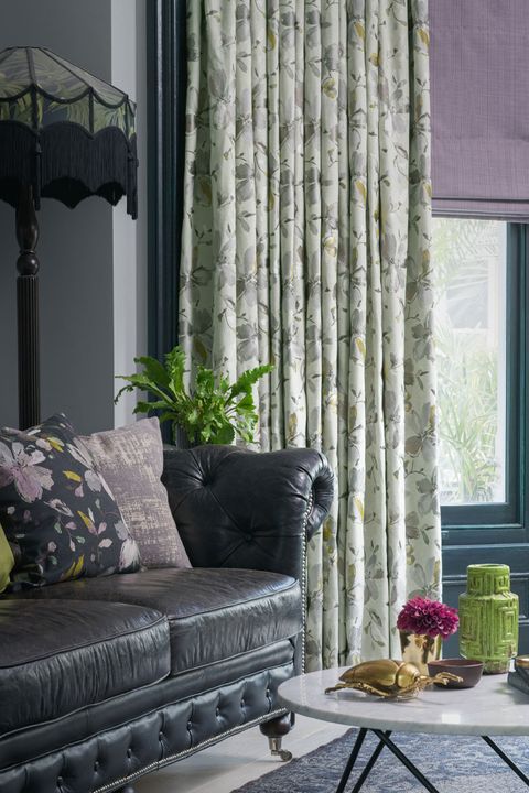 Close up of Forenza Sterling curtains Clarence Mauve romans in living room