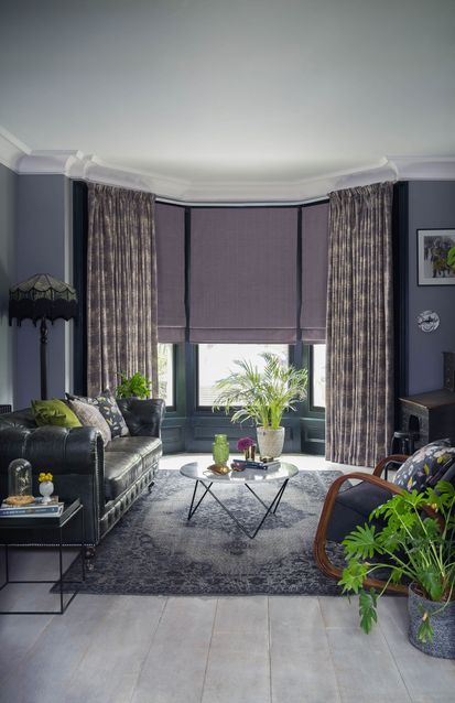 Infinity Lilac Grey curtains and Clarence Mauve romans in the living room