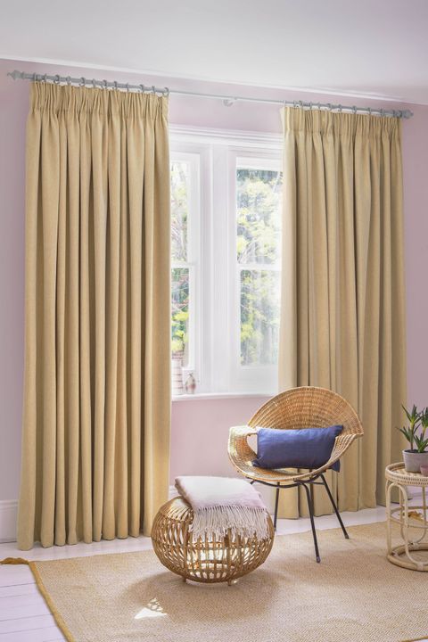 Kendra Maize curtains at wide window in bedroom