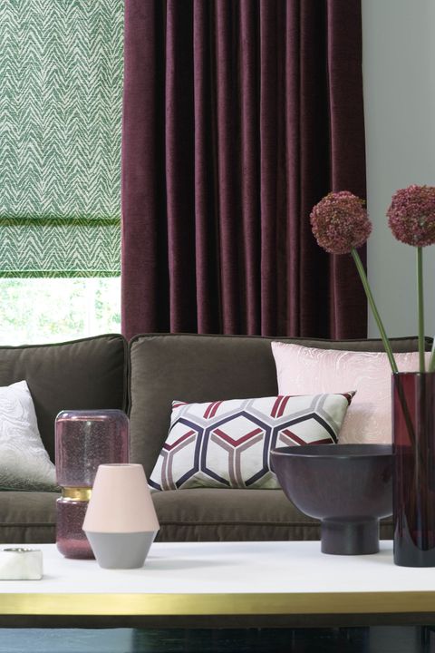 Close up of Lyon Merlot curtains and Jagger Everglade romans in living room