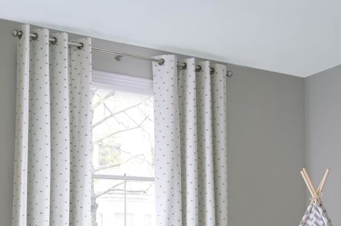 Polaris Ivory curtains and Jive Mallow Romans in a children's bedroom