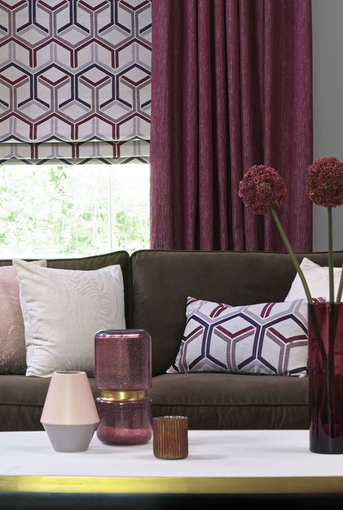 Close up of Surface Port curtains and  Metro Maroon Romans in the living room
