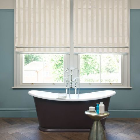 Pearl and cream stripy Roman blinds in a bathroom