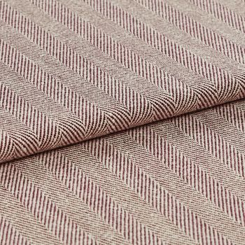 Stripes of red and cream in small diagonal lines that repeat across the fabric