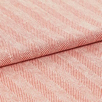 The Kendra Coral Haze fabric folded, showing its lightly toned striped coral design