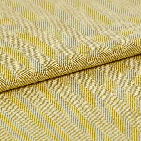 A folded view of the Kendra Maize fabric, showing its striped yellow design