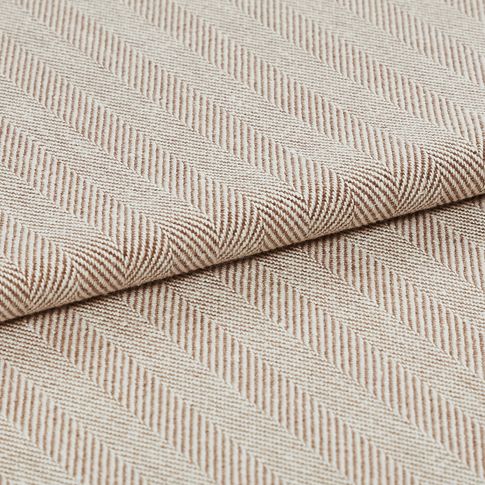 The neutrally styled Kendra Woodrose fabric folded