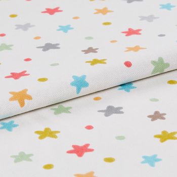 White fabric featuring a repeating pattern of dots and stars in a range of colours