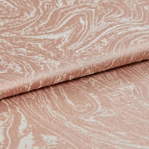 Pink and white combined in a swirling pattern that repeats throughout the material