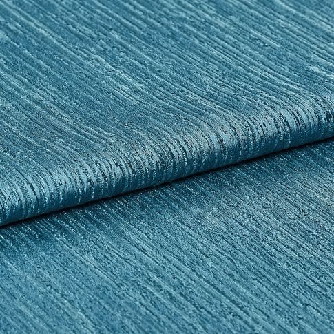 Teal Blue material with a shining quality and repeating textured pattern