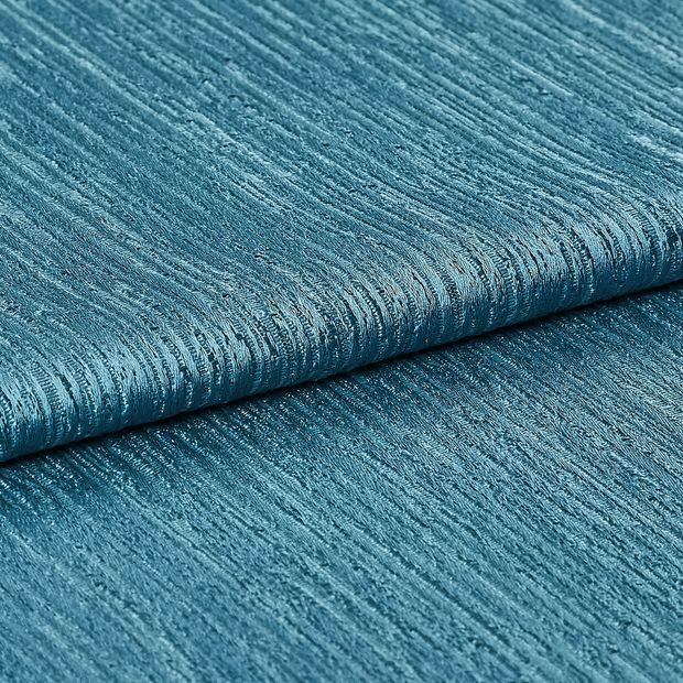 Teal Blue material with a shining quality and repeating textured pattern