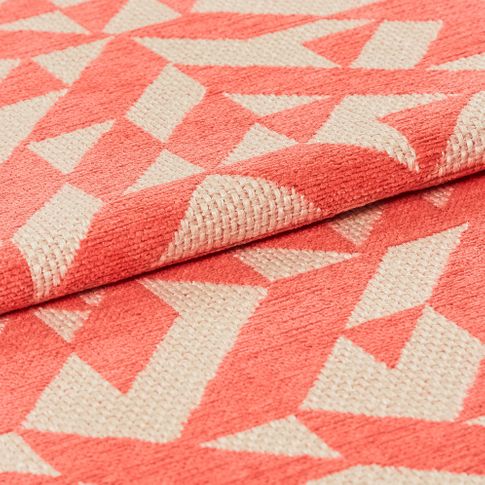 Cream and light pink in a geometric pattern that repeats throughout the material
