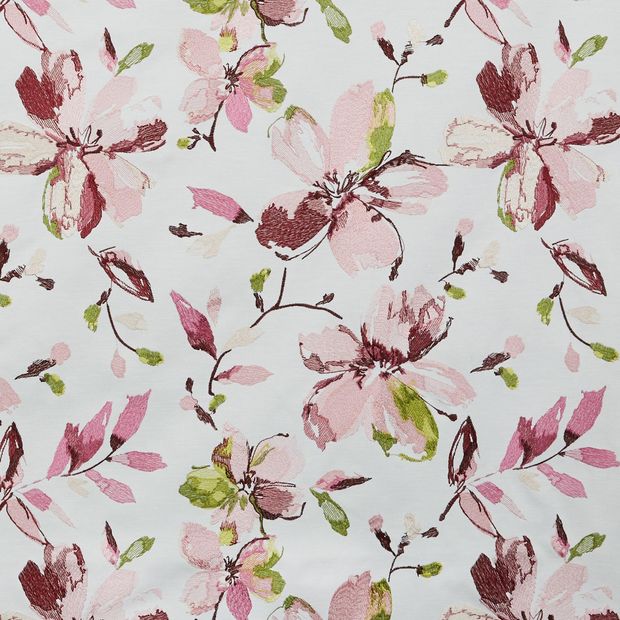 Forenza Rose swatch is a floral embroidery in multiple rose shades with splashes of green