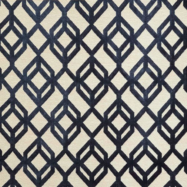 Loxly Ink swatch is a natural cream base with a dark inky navy, trellis-like geometric pattern